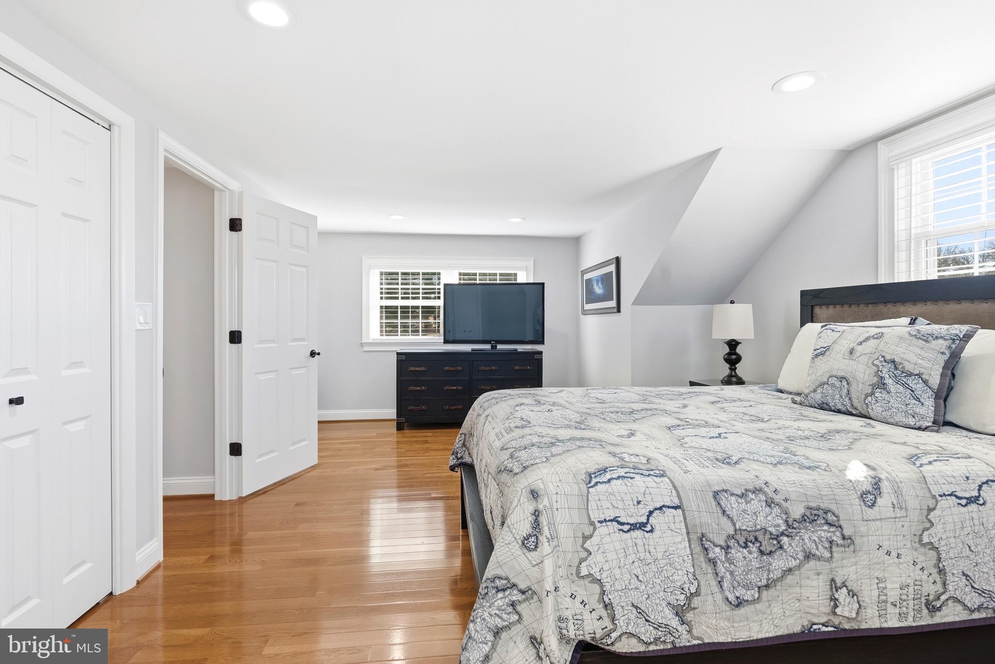 6837 White Rock Road Sykesville, MD 21784 - Photo 7 of 36 a spacious bedroom with a bed and a view of kitchen