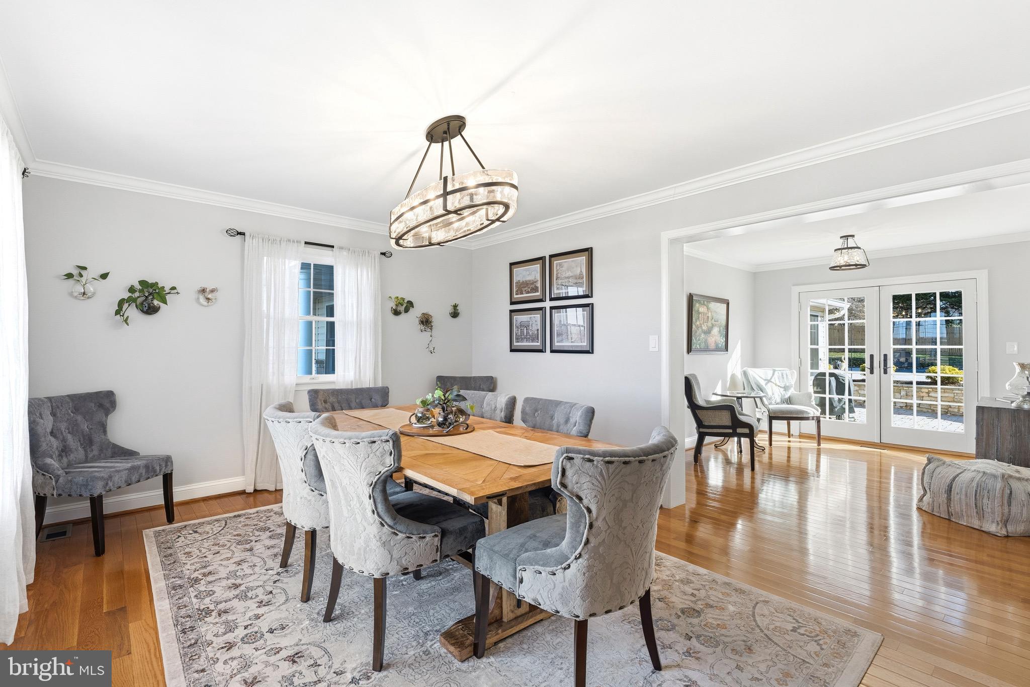 6837 White Rock Road Sykesville, MD 21784 - Photo 9 of 36 a view of a dining room with furniture window and wooden floor