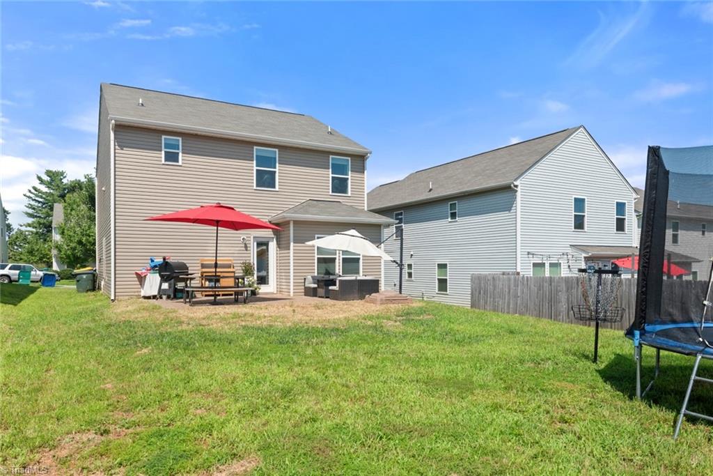 1028 Bitting Hall Circle Rural Hall, NC 27045 - Photo 26 of 28 level rear yard