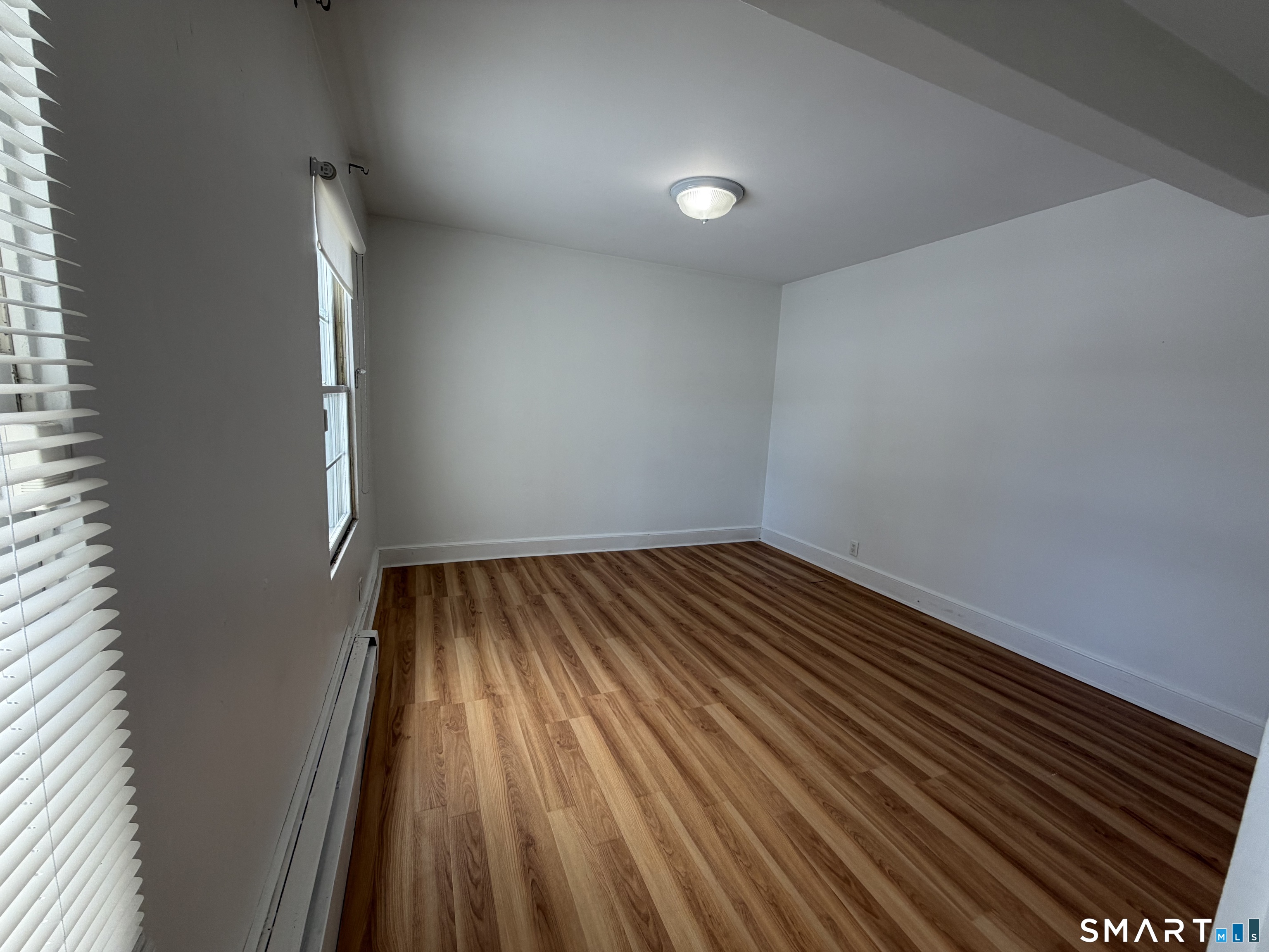 57 Chapel Street Wallingford, CT 06492 - Photo 11 of 18 a view of wooden floor