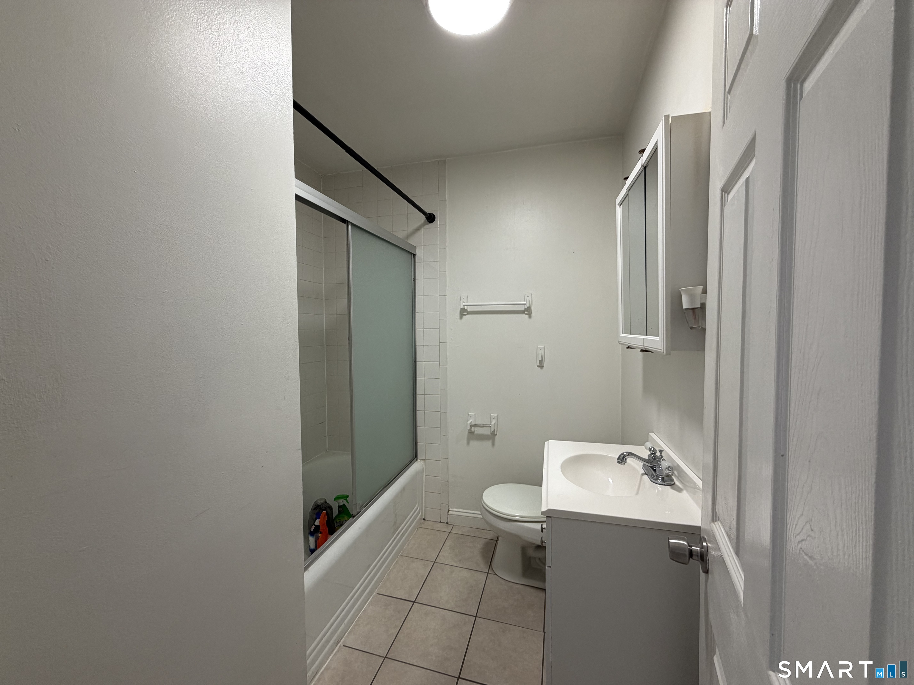 57 Chapel Street Wallingford, CT 06492 - Photo 9 of 18 a bathroom with a sink toilet and shower