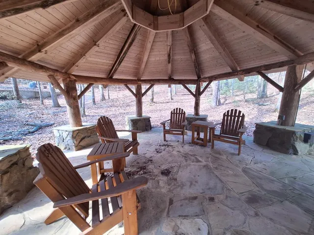 a view of outdoor space with deck and tree