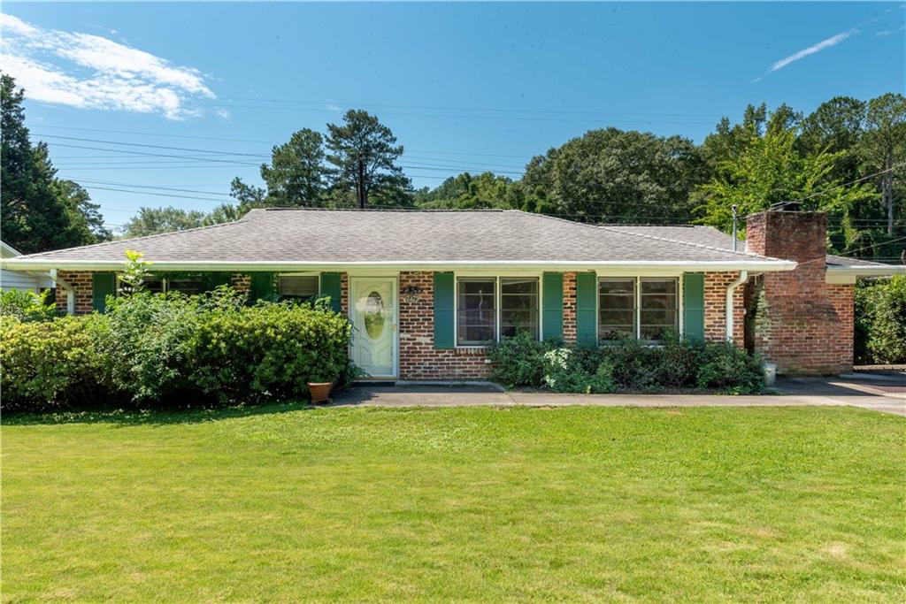 2479 Harrington Drive Decatur, GA 30033 - Photo 1 of 1 a front view of a house with a yard
