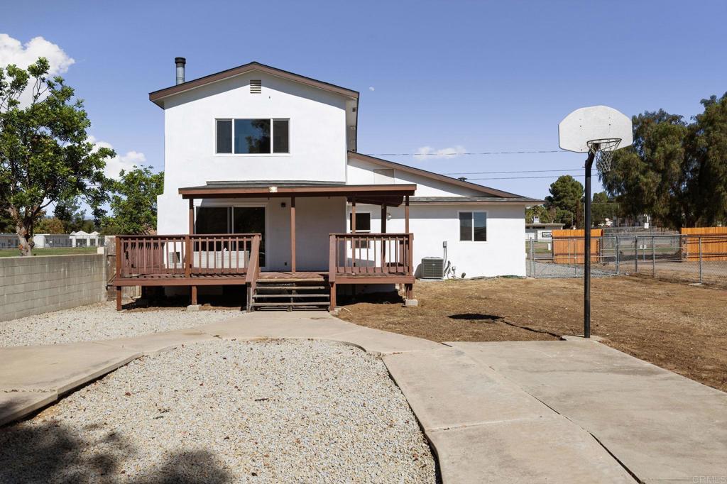 611 9th Street Ramona, CA 92065 - Photo 33 of 39 a view of a house with a snow in the yard