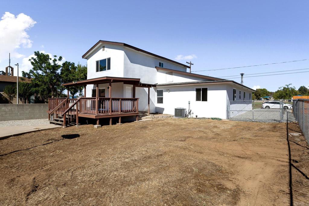 611 9th Street Ramona, CA 92065 - Photo 38 of 39 a big house with a yard and large trees