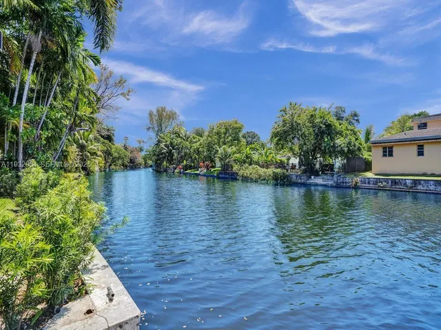 a view of a lake with houses