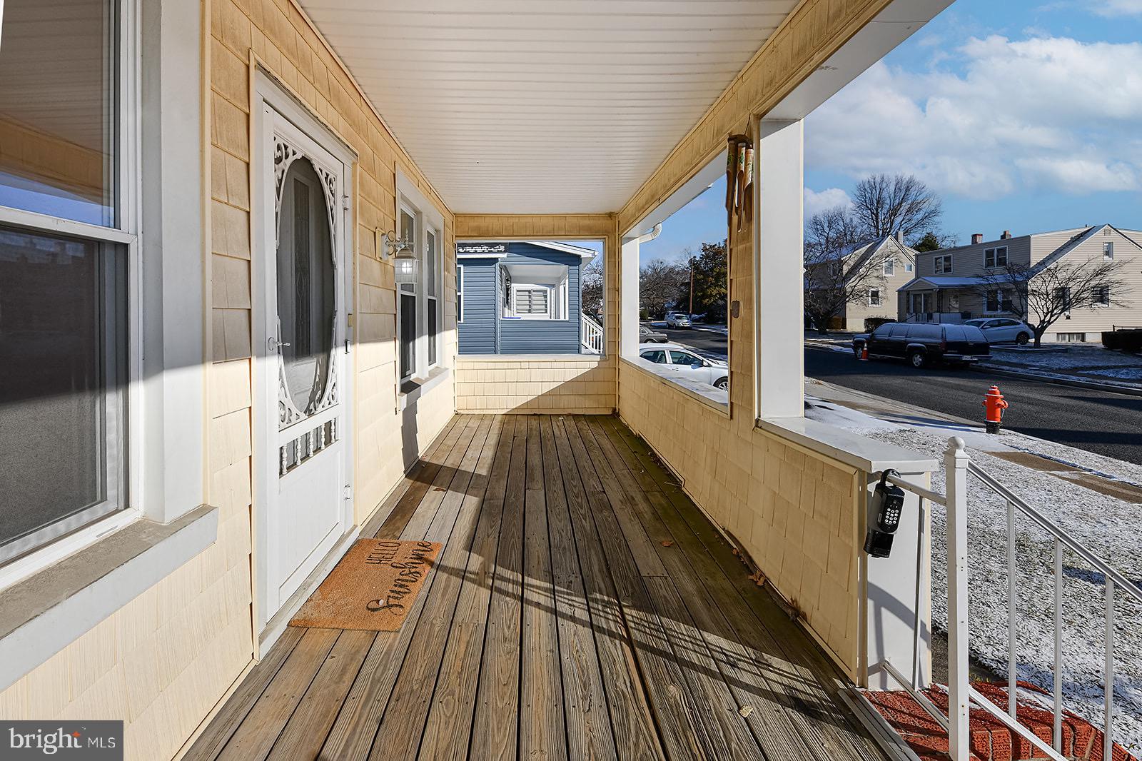 112 Linhigh Avenue Nottingham, MD 21236 - Photo 3 of 45 Charming porch inviting you to relax outdoors.