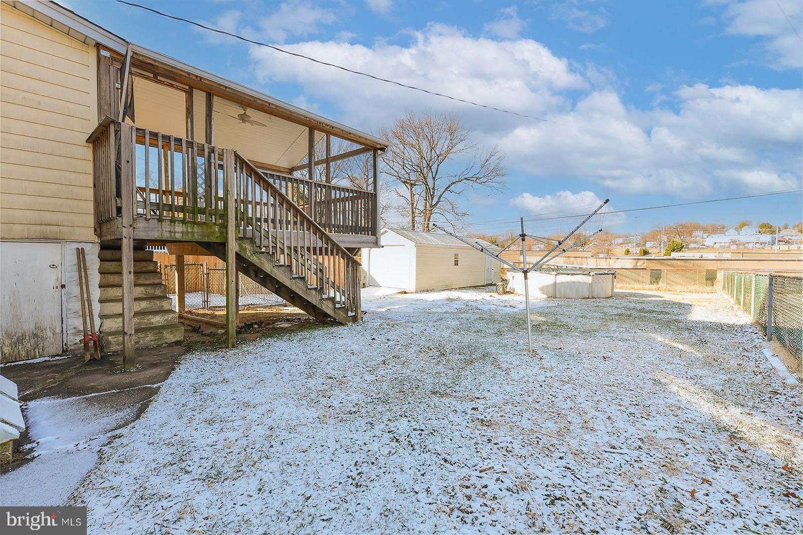 112 Linhigh Avenue Nottingham, MD 21236 - Photo 37 of 45 Stair access from deck to rear yard
