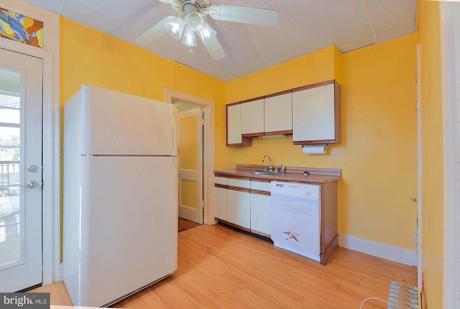 112 Linhigh Avenue Nottingham, MD 21236 - Photo 9 of 45 Bright and inviting kitchen with cheerful hues.
