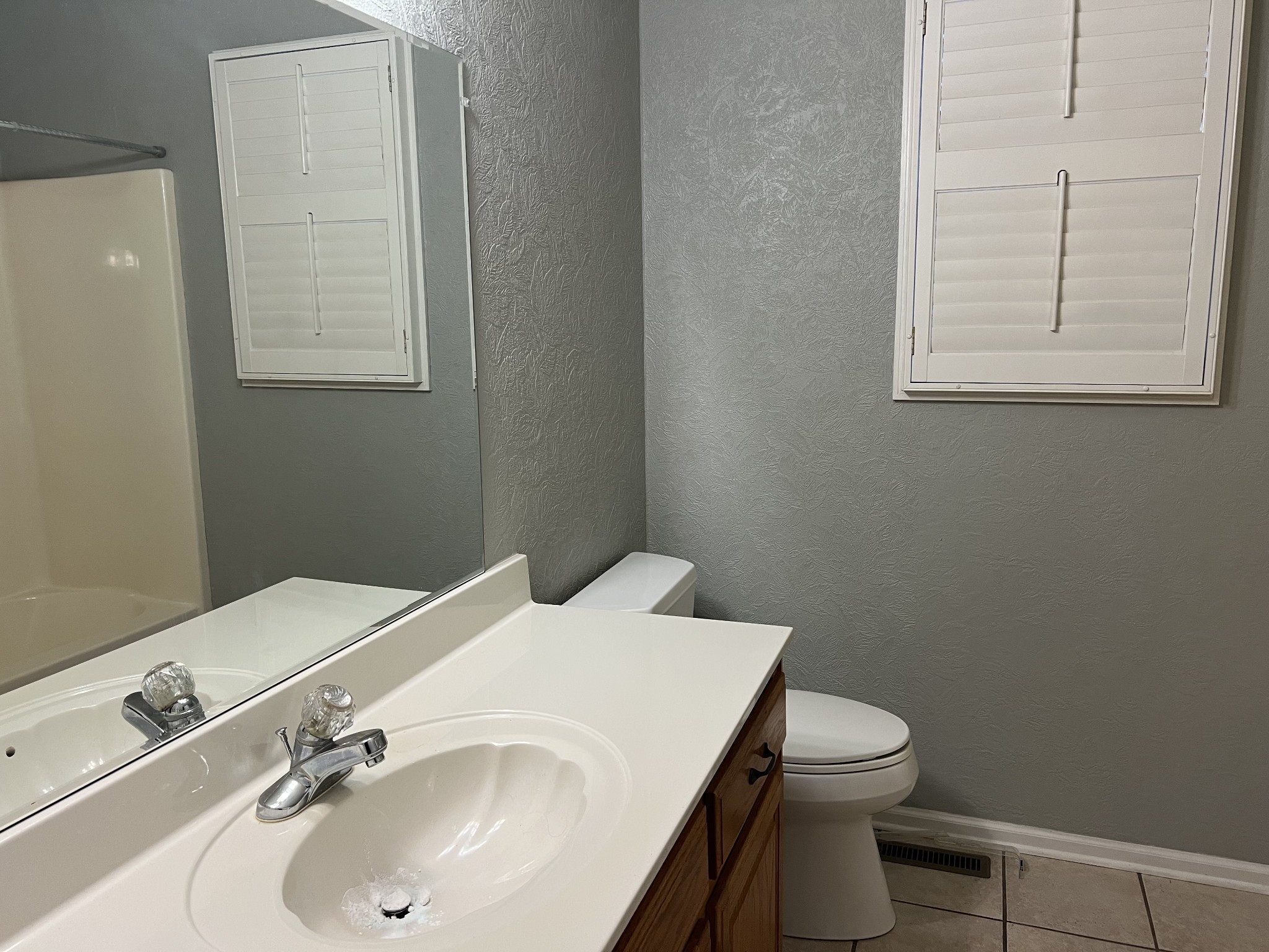 3716 Scottsville Road Lafayette, TN 37083 - Photo 16 of 21 a bathroom with a sink and a toilet