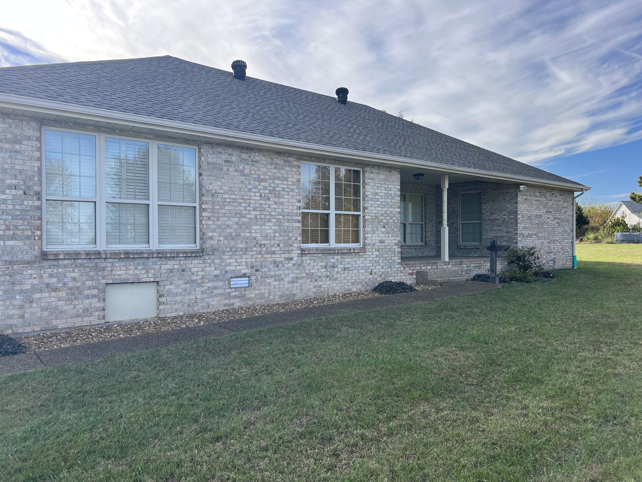 3716 Scottsville Road Lafayette, TN 37083 - Photo 19 of 21 a front view of a house with garden
