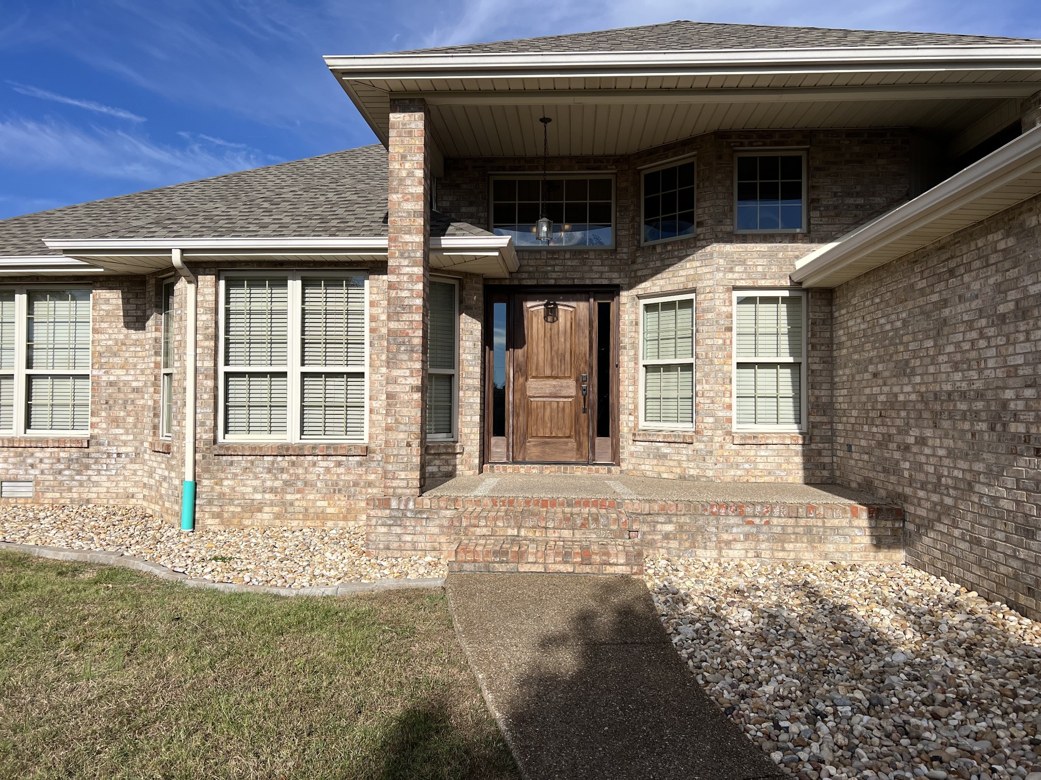3716 Scottsville Road Lafayette, TN 37083 - Photo 4 of 21 a view of a house with a door and a window