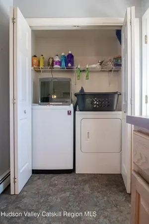 a utility room with washer and dryer