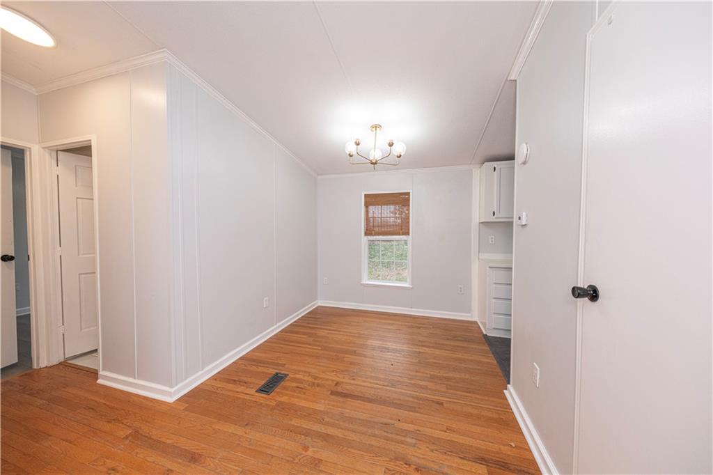 111 Leopard Road Evans City, PA 16033 - Photo 11 of 43 a view of an empty room with a window