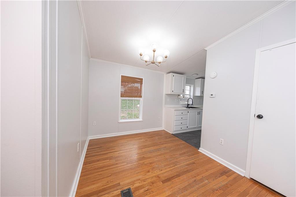 111 Leopard Road Evans City, PA 16033 - Photo 12 of 43 a view of a kitchen from the hallway