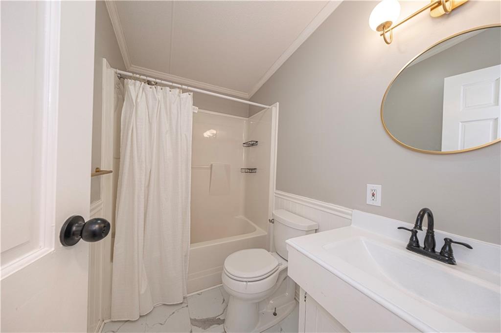 111 Leopard Road Evans City, PA 16033 - Photo 26 of 43 a bathroom with a sink toilet and shower