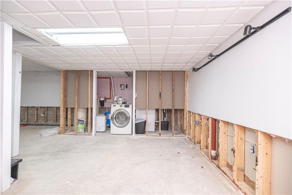 111 Leopard Road Evans City, PA 16033 - Photo 29 of 43 a view of a hallway with a car garage