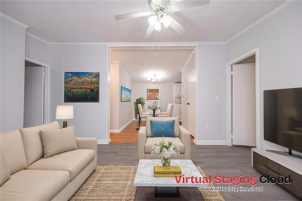 111 Leopard Road Evans City, PA 16033 - Photo 7 of 43 a living room with furniture and a flat screen tv