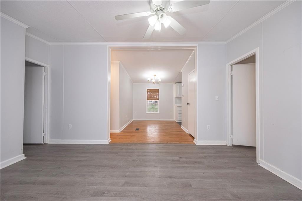 111 Leopard Road Evans City, PA 16033 - Photo 8 of 43 a view of an empty room and chandelier fan