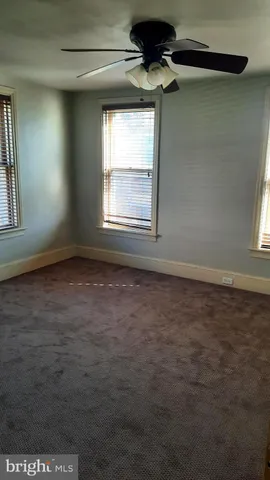 a view of swimming pool with outdoor seating