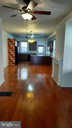 a kitchen with stainless steel appliances granite countertop a sink stove and microwave