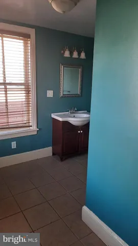 a bathroom with a shower and a toilet