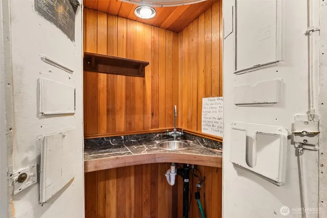 a room with a fireplace and painted walls