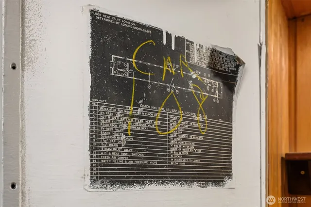 a view of a hallway with a large window