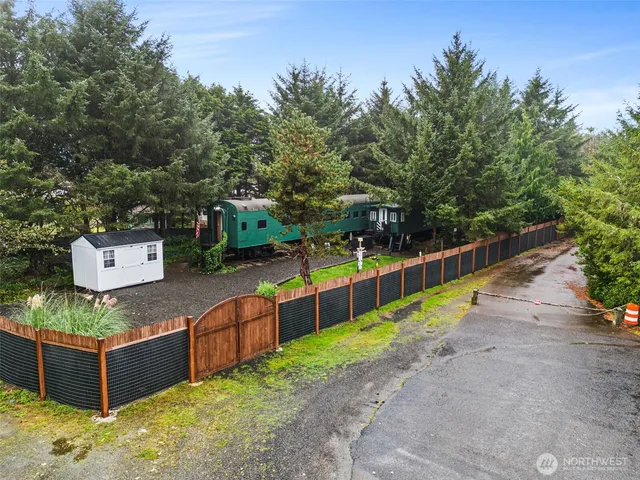 an outdoor space with lots of trees