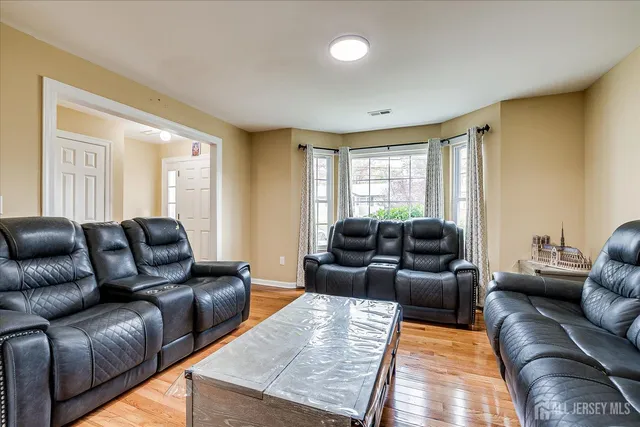 a living room with furniture and a couch