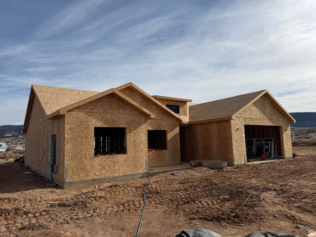 4062 North 970th East Enoch, UT 84721 - Photo 3 of 3 View of front of house featuring stucco siding