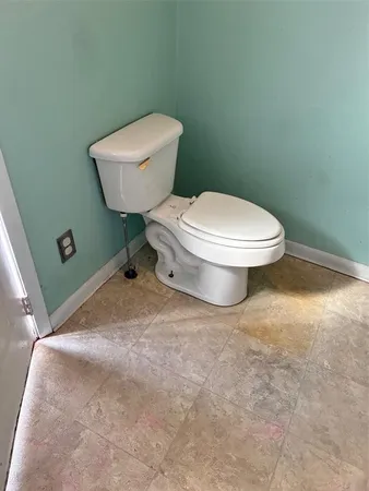 a bathroom with a toilet