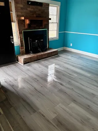 a living room with a fireplace