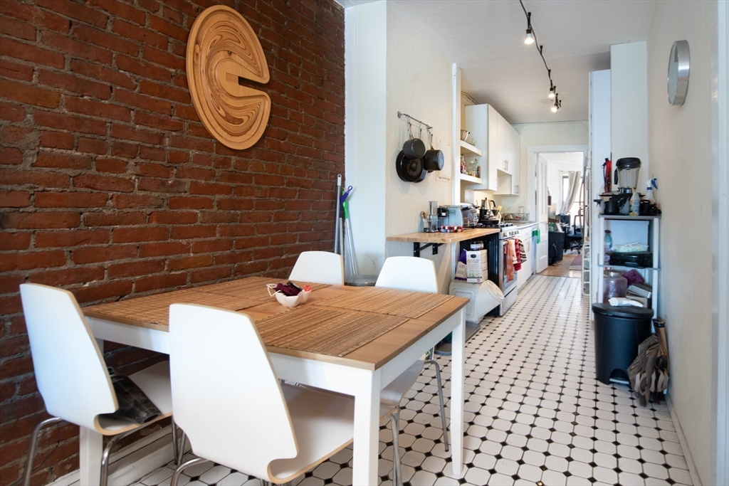 918 Beacon Street, Unit 3 Boston, MA 02215 - Photo 5 of 19 a view of a dining room with furniture