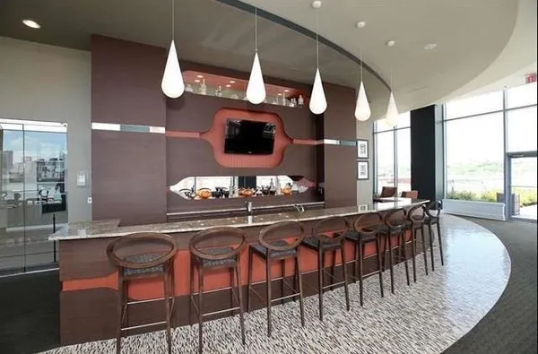 a kitchen with a dining table and chairs