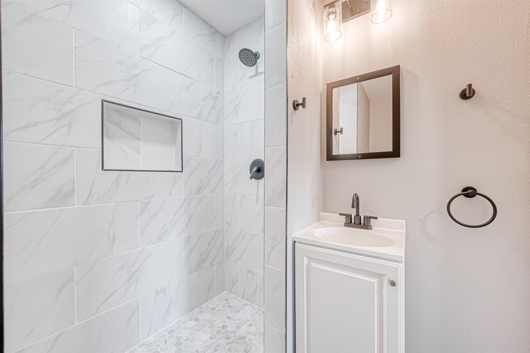 6715 Victoria Street Houston, TX 77020 - Photo 39 of 46 a bathroom with a sink and a mirror