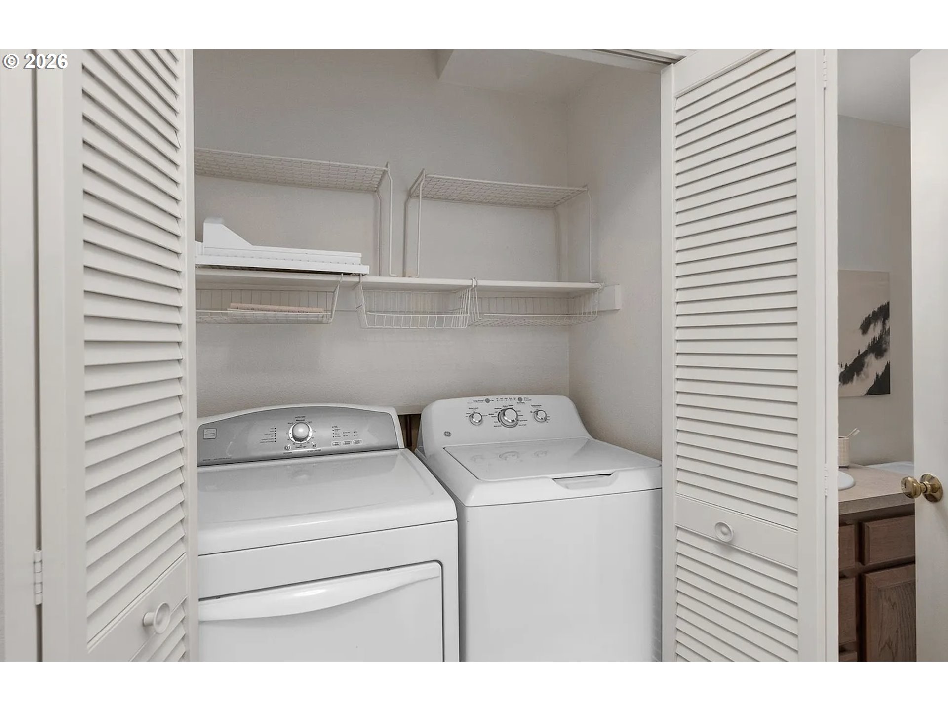 8720 Southwest Tualatin Road, Unit 205 Tualatin, OR 97062 - Photo 19 of 23 a utility room with dryer and washer
