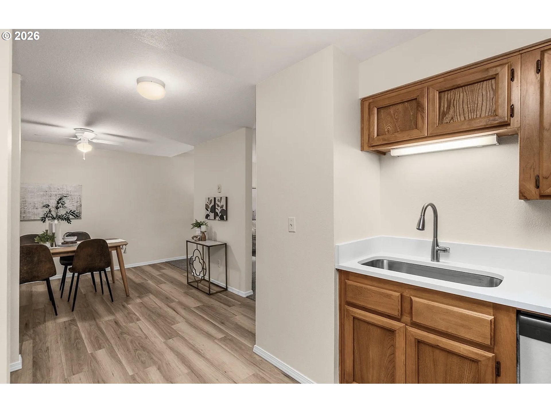 8720 Southwest Tualatin Road, Unit 205 Tualatin, OR 97062 - Photo 6 of 23 a kitchen with a table and chairs