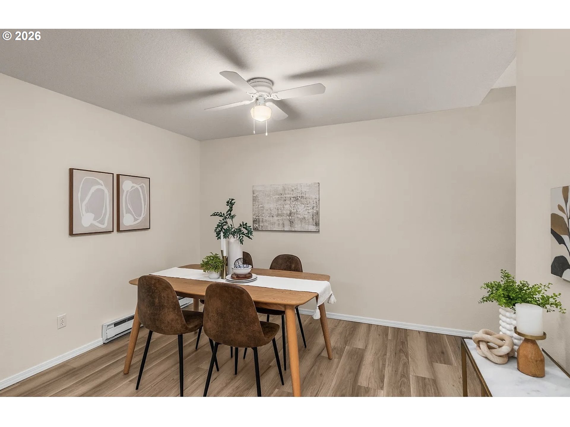 8720 Southwest Tualatin Road, Unit 205 Tualatin, OR 97062 - Photo 8 of 23 a view of a dining room with furniture and wooden floor