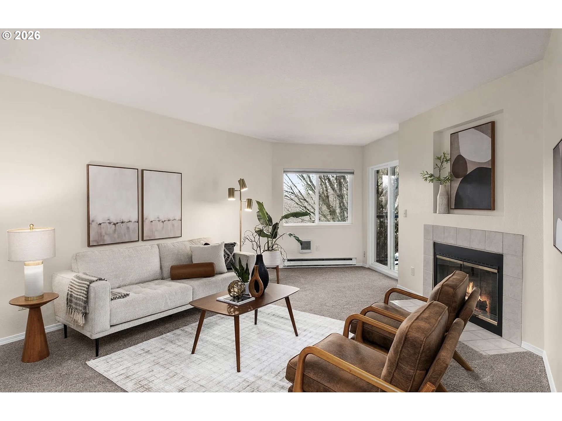 8720 Southwest Tualatin Road, Unit 205 Tualatin, OR 97062 - Photo 10 of 23 a living room with furniture and a fireplace