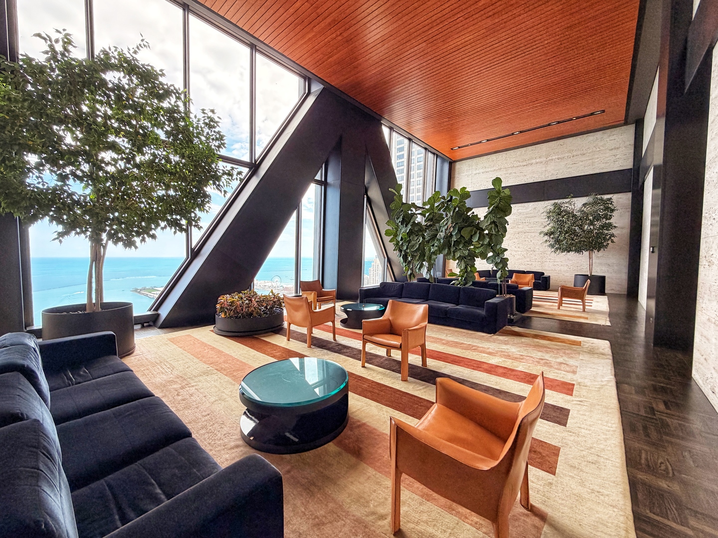 175 East Delaware Place, Unit 5808 Chicago, IL 60611 - Photo 28 of 29 a outdoor space with patio the couches and a dining table with chairs