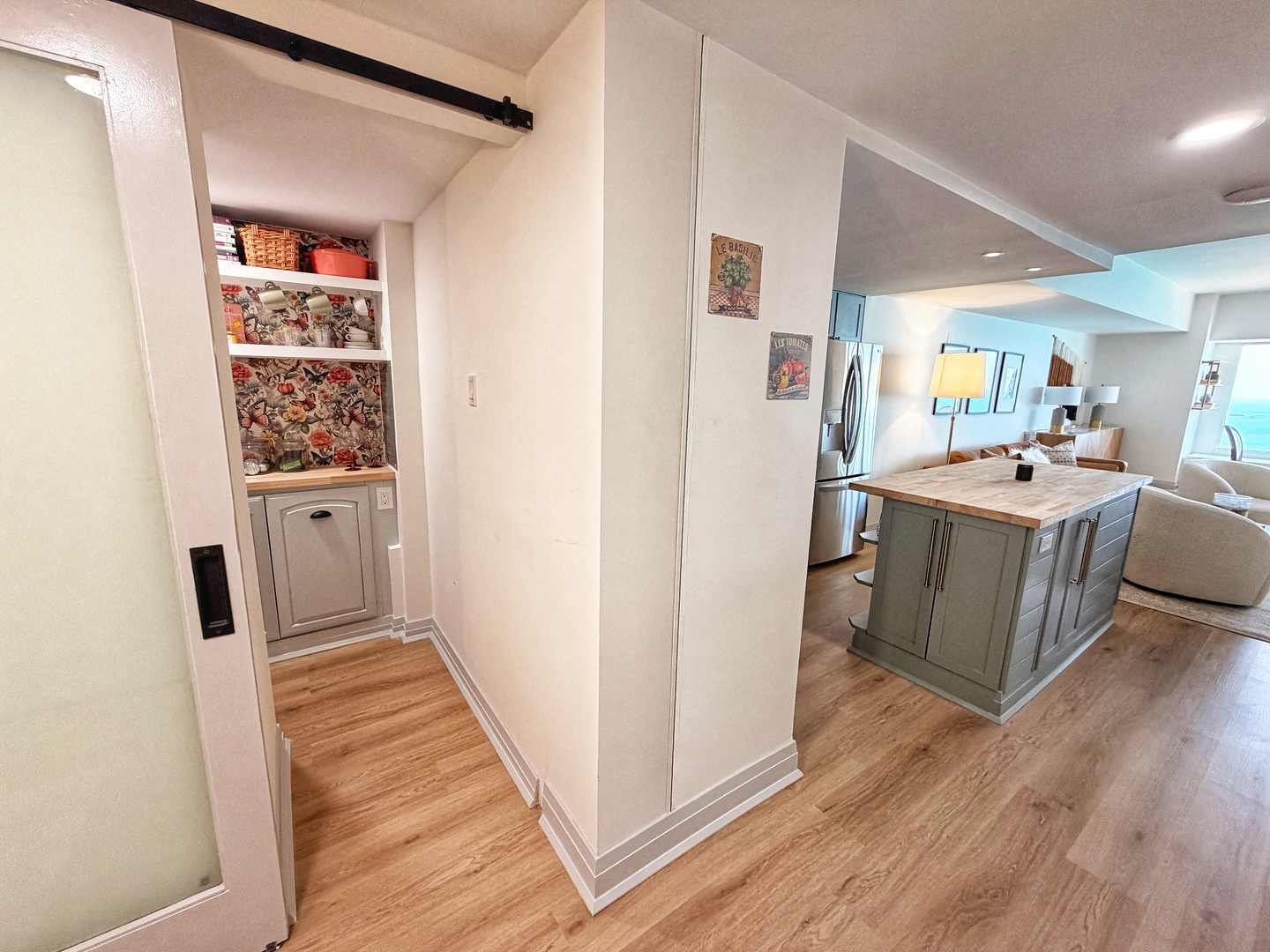 175 East Delaware Place, Unit 5808 Chicago, IL 60611 - Photo 7 of 29 a view of a hallway view with wooden floor and furniture