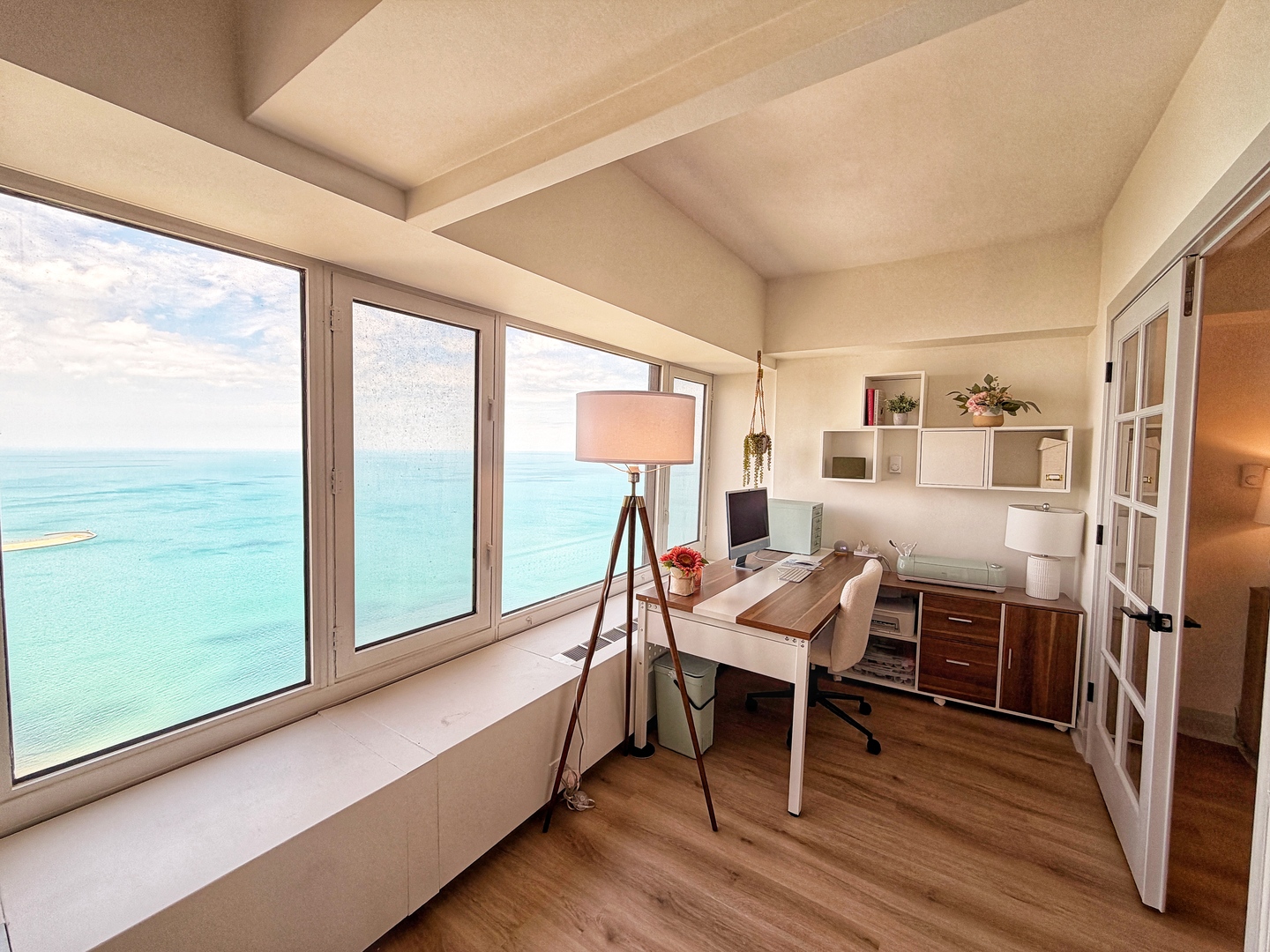 175 East Delaware Place, Unit 5808 Chicago, IL 60611 - Photo 10 of 29 a dining room with furniture and wooden floor