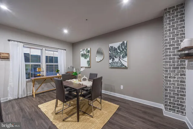 a workspace with furniture and wooden floor