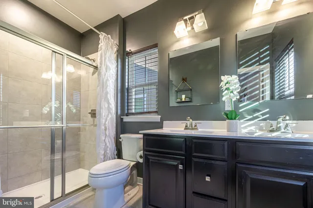 a dining room with a table and chairs