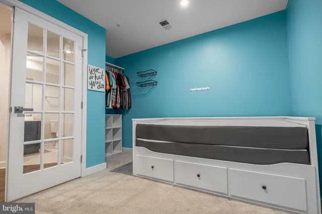 a bathroom with a sink toilet and mirror