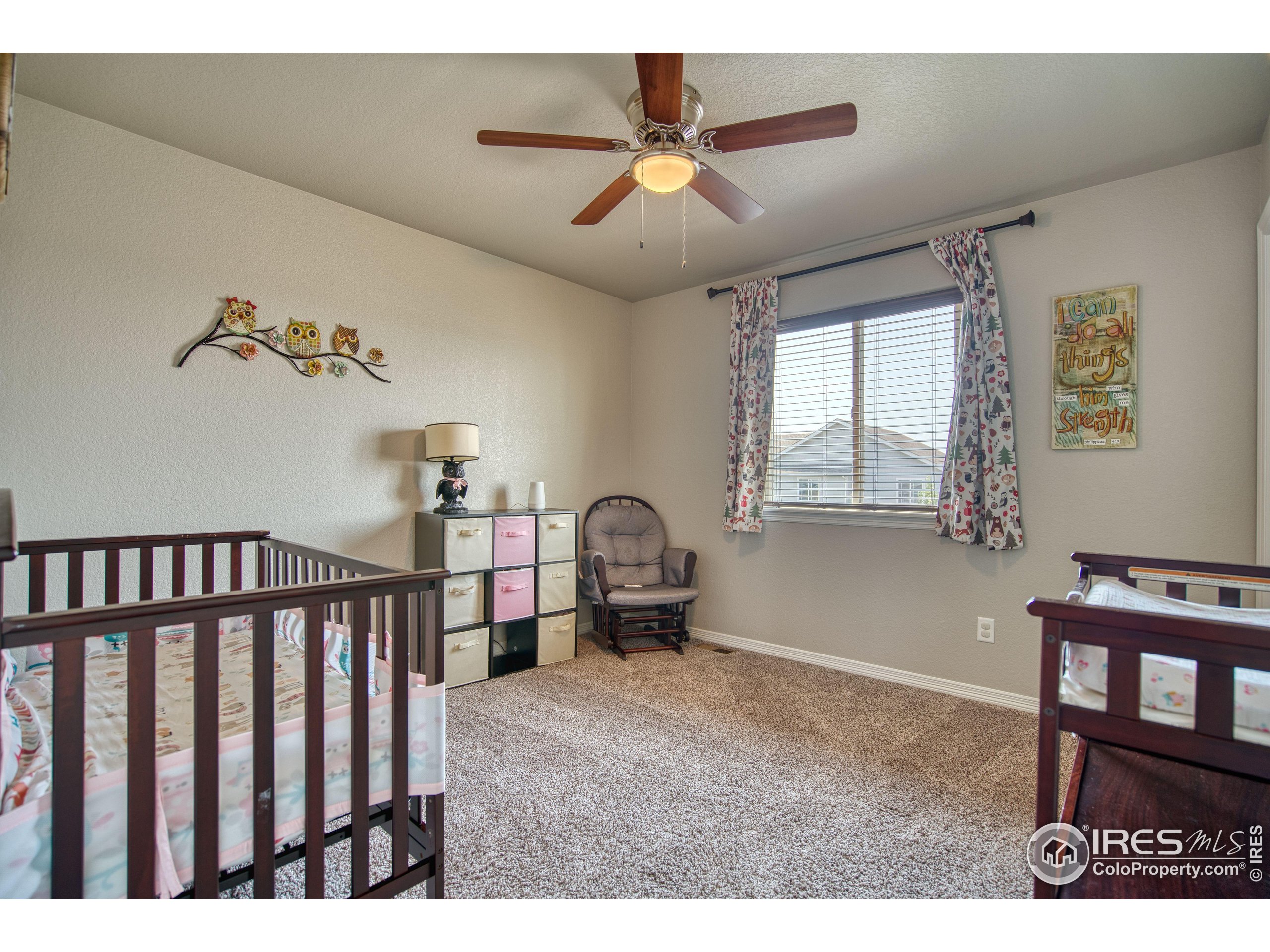 1866 Egnar Street Loveland, CO 80538 - Photo 19 of 28 a living room with furniture