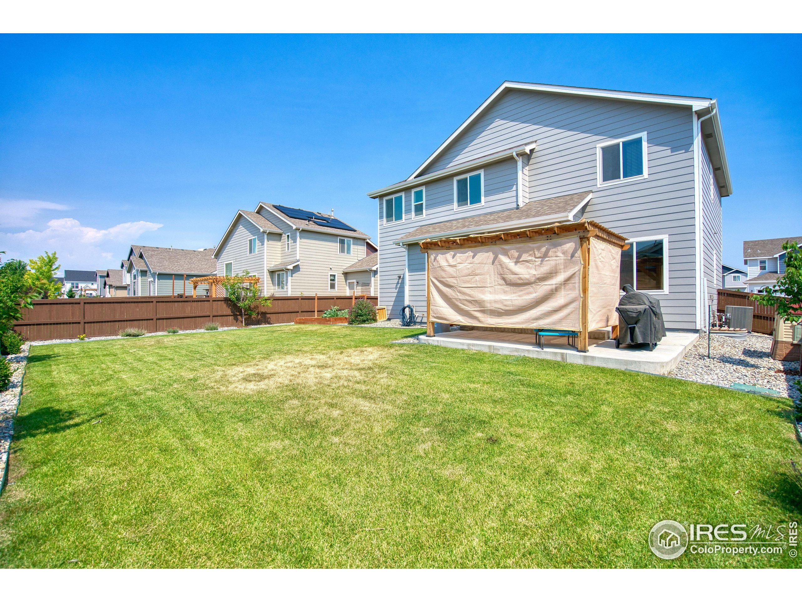 1866 Egnar Street Loveland, CO 80538 - Photo 27 of 28 a front view of a house with garden