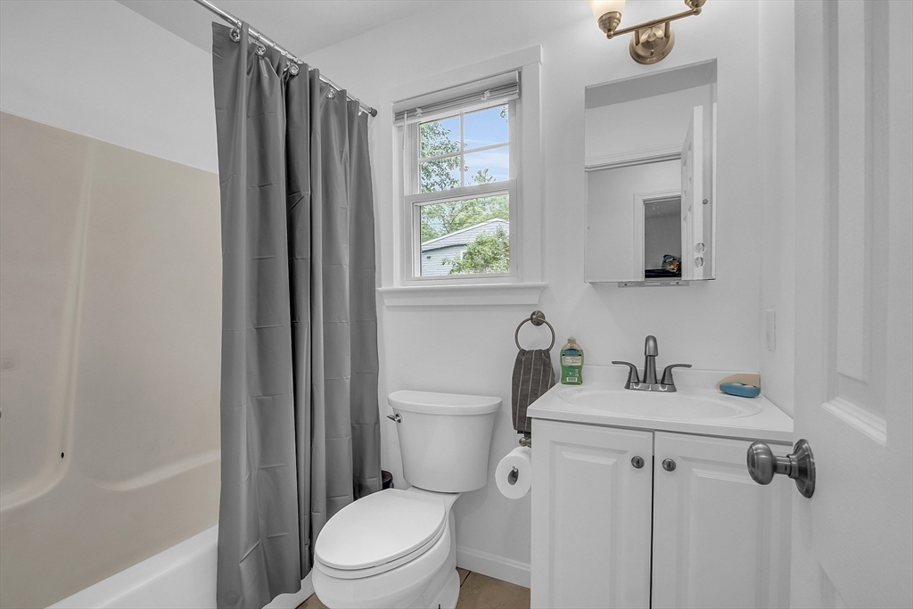 58 Indian Road Groton, MA 01450 - Photo 22 of 35 a bathroom with a sink toilet and shower