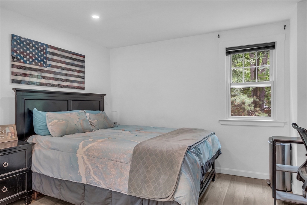 58 Indian Road Groton, MA 01450 - Photo 26 of 35 a bedroom with a bed and a window